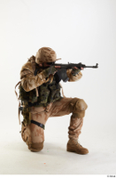  Photos Robert Watson Army Czech Paratrooper Poses aiming gun kneeling whole body 0006.jpg